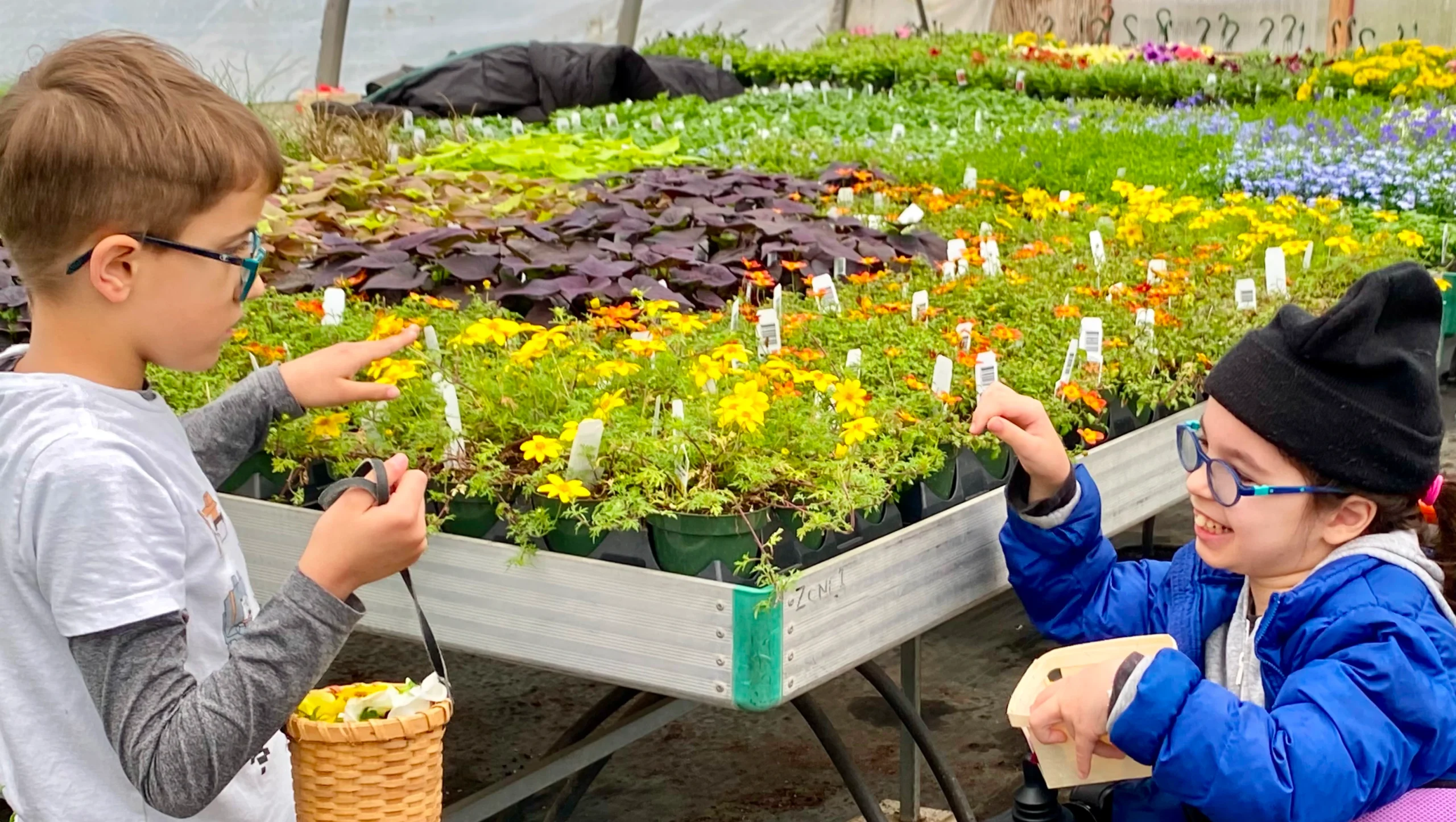 Two disabled child playing in the garden